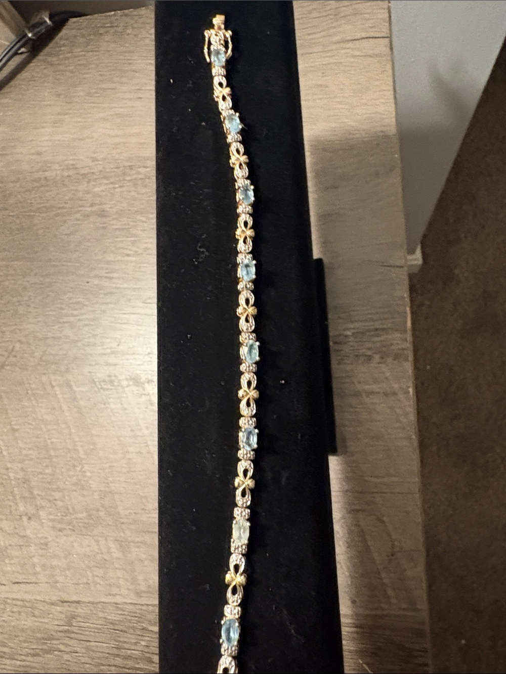 Gold-Tone Bracelet with Light Blue Stones